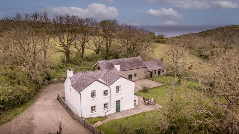An aerial view of Caerllan with the sea in the background, Ceredigion